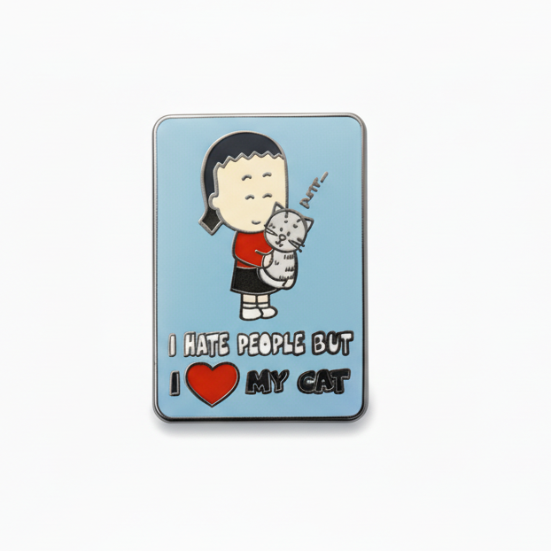 A pin badge featuring the cartoon character Kim, the Angry Little ASian Girl, holding a cat with the text 'I HATE PEOPLE BUT I LOVE MY CAT'.