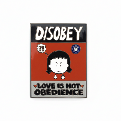 A pin with Kim, the Angry Little Asian Girl, a cartoon girl character, red background, and text that says 'DISOBEY' and 'LOVE IS NOT OBEDIENCE' along with the 'ANGRY LITTLE GIRLS' logo at the bottom.
