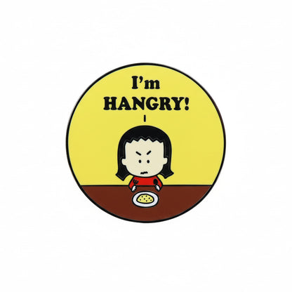 A pin badge with an illustration of Kim, the Angry Little Asian Girl, a cartoon character and the text 'I'm HANGRY!'